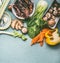 Various traditional asian ingredients for tasty vegetarian cooking : mushrooms , vegetables and spices, top view, flat lay.