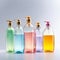 various transparent bottles for liquid soap or shampoo with liquid soap bubbles, white background, minimalistic studio design,