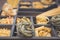 Various types of Italian pasta in a wooden box with different cells