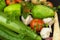 Various types of vegetables on an old wooden table. Sales of fresh vegetables.