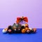 Various typical halloween sweets on a black background. Useful as a background for commercial purposes