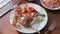 Various Variations of Meat Dishes on White Plate - Fried Sausages, Bacon, Kebab