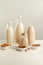 Various vegan plant based milk and ingredients. Dairy free milk substitute drinks in glass bottles