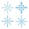 Various winter snowflakes blue on white