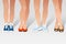 Various woman`s legs with different shoes on feet