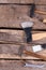 Various working tools on wooden boards background.