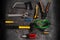 Various yellow repair tools, equipment for building. Grey background top view