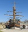 VARNA, BULGARIA - APRIL 11, 2015: Sailing ship with statue of an