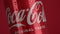 Varna, BULGARIA - FEBRUARY 13, 2024: Close up of classic Coca Cola original taste, red can with water drops, rotating.