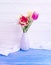 Vase bouquet of tulips decor arrangement home colorful romantic elegance on wooden background