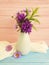 vase of chrysanthemum natural beauty interior decorative flower, bell on wooden background