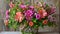 A vase filled with numerous vibrant flowers of different colors and types, creating a striking and lively arrangement, A beautiful