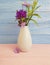 Vase flower chrysanthemum on wooden background arrangement