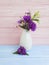 Vase flowers bouquet bell, purple floral design table beauty decorative spring chrysanthemum arrangement on a wooden background