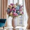 Vase with Hydrangea flowers by the window. Beautiful modern still life of flowers in a white vase on a stylish table in a interior