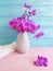 Vase orchid flower arrangement bouquet creative freshness modern decorate elegance arrangement on a wooden background