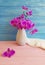 Vase orchid flower arrangement color bouquet creative freshness modern decorate elegance arrangement on a wooden background