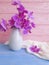 Vase orchid flower bouquet vintage modern decorate elegance arrangement on a wooden background