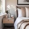 Vase with orchids on bedside table near bed with beige bedding. Art deco style interior design of modern bedroom. Created with