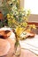 Vase with spring flowers cherry blossoms and Forsythia