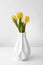 vase with tulips table. High quality beautiful photo concept