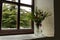 Vase of wildflowers on a window ledge