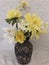 Vase with yellow flowers