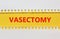 Vasectomy symbol. Concept words Vasectomy on yellow and white paper. Beautiful white background. Medical and vasectomy problem