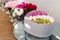 Vases with bouquets of flowers. storage of donated flowers at a banquet in a restaurant