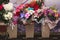 Vases with bouquets of flowers. storage of donated flowers at a banquet in a restaurant.