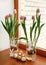 Vases with pink tulips on the window, Easter decor