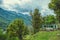 Vashisht village on background Himalayan mountans and blue sky with clouds