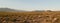 Vast arid valley in Uspallata, Mendoza, Argentina. Wide panoramic view