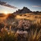 A vast, desolate landscape with towering cliffs and jagged rocks stretching out into the distance.