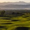 Vast golf course with view of trees and mountain