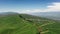 Vast grasslands and mountains in a fine day