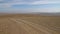 Vast hilly landscape in the Mongolian steppe. Pan view footage over the horizon over land