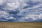 Vast Kyrgyz steppe, near Songkol lake. Dramatic sky.