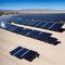 Vast outdoor solar panel farm in a desert.