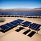 Vast outdoor solar panel farm in a desert.