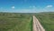 Vast Prairie Landscape Under Expansive Horizon With Railroad