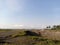 The vast prairie plains under a clear sky.