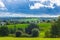 Vast rural landscape with houses