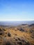 Vast view of southern Utah from Larb Hollow Overlook, in late autumn, from mountaintop pass