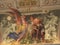 Vatican, December 10, 2019. Frescoes on the vaults of the temple. Church decor element. People and angels are depicted on a stone