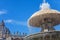 Vatican fountain in St. Peter`s Square in Rome. Vatican City