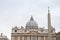 Vatican obelisk and Dome of Saint Peters Basilica in Rome, Italy