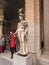 Vatican, Rome, Italy, tourists take pictures next to the statues.