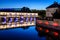 The Vauban Dam illuminated at nightfall in the Petite France historic quarter in Strasbourg, France