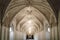 vaulted cathedral ceiling with detailed stone carvings